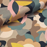 Gorgeous viscose print of latte pink ochre and black in a modern floral design. Wonderful for dressmaking, tops, skirts and wide leg trousers. Available to buy online at fabric Focus in half metre increments.