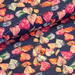 A wonderful medium dressmaking weight linen. Linen mixed with natural viscose. A digital print of multicoloured leaves on a french navy background.  Available to buy in metre increments from Fabric Focus Edinburgh. 