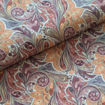 A wonderful medium dressmaking weight linen. Linen mixed with natural viscose. A digital modern print of henna inspired shapes in brown, gold and grey on a white background.   Available to buy in metre increments from Fabric Focus Edinburgh. 