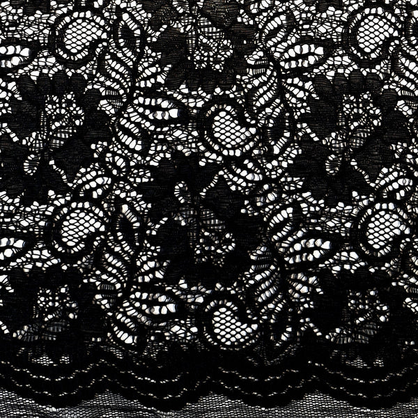 Tocca Lace  is an exquisite corded lace fabric with a pretty scallop along both edges. The colours available in this range are simply stunning and will be perfect to make a statement piece for a wedding, special occasion and evening wear. In the classic black colourway. Available to buy in half metre increments.