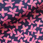 Beautiful cerise clematis blooms picked out with ochre centres on a deep navy background.  Perfect from shirts, tops, dresses and PJs. Available in half metre increments at Fabric Focus. Colours may vary due to differences in computer settings. 