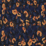 A beautiful print of amber flowers on a cobalt/navy background. Perfect for wrap dresses, wide legged trousers and blouses. Manufacturer recommends 30 degree wash but please allow for shrinkage and test a piece before hand.  Sold in half metre increments at Fabric Focus Edinburgh.