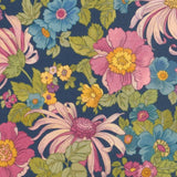 Beautiful colourful flowers on a dark navy background.  Perfect from shirts, tops, dresses and PJs. Available in half metre increments at Fabric Focus. Colours may vary due to differences in computer settings. 