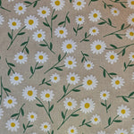 Cute little white and yellow daisies with small green leaves over a neutral background.  A printed half panama European produced fabric, it is Cotton Rich and is also referred to as a canvas by some. Widely used for Bag Making, Apparel and Crafting. Available in half metre increments at Fabric Focus.
