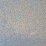 Tocca Lace  is an exquisite corded lace fabric with a pretty scallop along both edges. The colours available in this range are simply stunning and will be perfect to make a statement piece for a wedding, special occasion and evening wear. In the softest icy blue colourway called Illusion Blue. Available to buy in half metre increments.