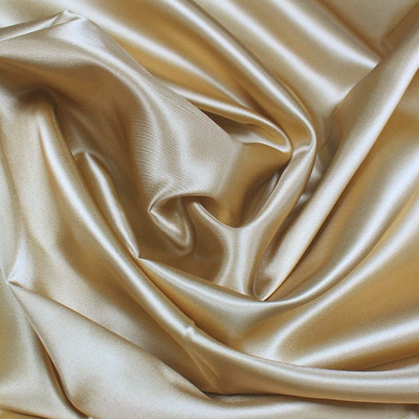 A great satin for evening wear or as a luxurious lining to a coat or jacket. Comes in various beautiful shades. This being the delicate coffee. Dry Clean Only NOTE - This fabric will mark if in contact with water Use a dry iron when pressing Available to buy online in half metre increments at Fabric Focus Edinburgh.