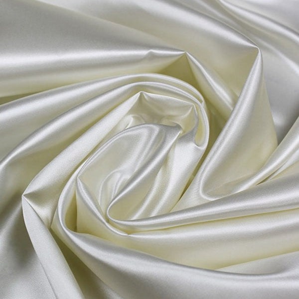 A great satin for evening wear or as a luxurious lining to a coat or jacket. Comes in various beautiful shades. This being the delicate cream. Dry Clean Only NOTE - This fabric will mark if in contact with water Use a dry iron when pressing Available to buy online in half metre increments at Fabric Focus Edinburgh.