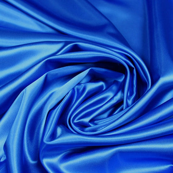 A great satin for evening wear or as a luxurious lining to a coat or jacket. Comes in various beautiful shades. This being the rich royal blue. Dry Clean Only NOTE - This fabric will mark if in contact with water Use a dry iron when pressing Available to buy online in half metre increments at Fabric Focus Edinburgh.