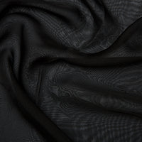Cationic chiffon is beautifully soft and flowing fabric. Many of the colours in this range have a two tone weave which show different shades when viewed at different angles. Cationic Chiffon drapes beautifully and is used in bridal and evening designs. Available to buy in half metre increments.