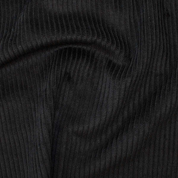 washed jumbo corduroy in black with a 4.5 wale. Available to buy in store and online at Fabric Focus.