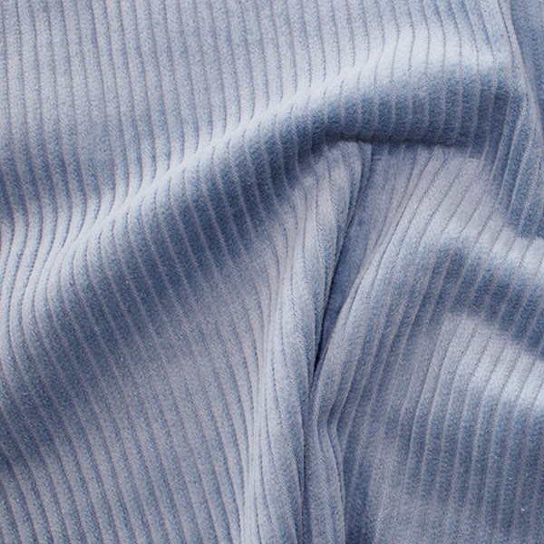 Lustrous and soft, Corduroy is also extremely durable and can be used in dressmaking, for soft furnishings and toys and even for upholstery. This is approximately a 4.5 wale. And comes in many wearable colours, this being a stunning pale denim blue. Available to buy online in half metre increments.