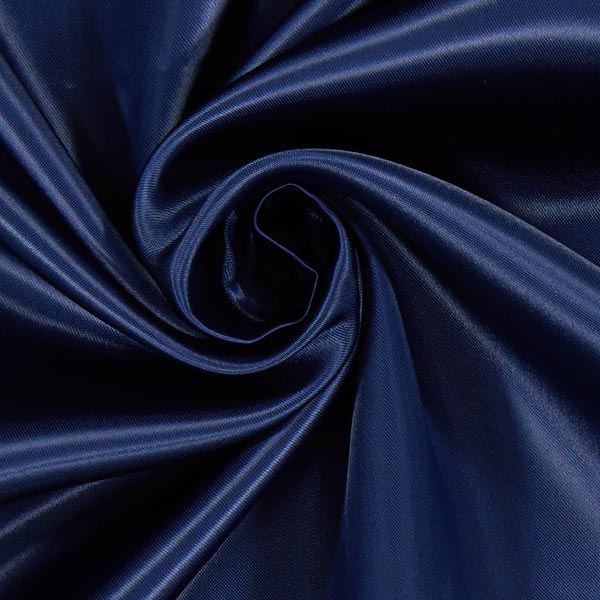 A great satin for evening wear or as a luxurious lining to a coat or jacket. Comes in various beautiful shades. This being the classic navy blue. Dry Clean Only NOTE - This fabric will mark if in contact with water Use a dry iron when pressing Available to buy online in half metre increments at Fabric Focus Edinburgh.