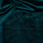Gorgeous Luxury Velvet with a superb sheen and a deep rich pile suitable for dressmaking, crafts and soft furnishings as well as curtains. Available in an array of beautiful shades, this being dark green. Available to buy online in half metre increments.
