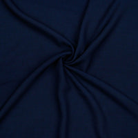 A beautiful plain viscose fabric in a stunning classic navy colour. perfect for wrap dresses, wide legged trousers and blouses. Mix with printed viscose for a great summer ensemble. Available to buy in half metre increments at Fabric Focus.