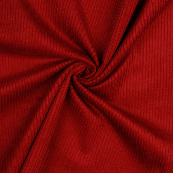 Lustrous and soft, Corduroy is also extremely durable and can be used in dressmaking, for soft furnishings and toys and even for upholstery. This is approximately a 4.5 wale. And comes in many wearable colours, this being a rich red. Available to buy online in half metre increments.