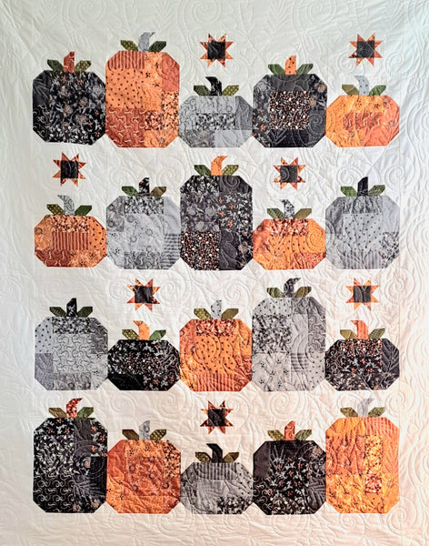 A wonderful Autumnal/Halloween quilt kit featuring rows of pumpkins with star highlights.   Available at Fabric Focus Edinburgh.