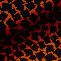 This soft and drapey polyester crepe fabric is a medium weight and is completely opaque, so perfect for sewing tops, skirts, dresses, trousers and jumpsuits. Orange background with black geometric squares. Available to buy in half metre increments at Fabric Focus