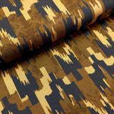 Textile with a geometric pattern in brown and blue on a roll.