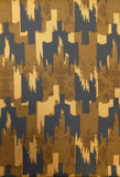 Patterned fabric with abstract design in brown, beige, and black