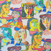 Stunning digital print on a polyester-cotton panama with Picasso Inspired colourful faces on a natural background. Great for bag making, cushions, lampshades, curtains and dressmaking projects Available to buy in half metre increments at Fabric Focus Edinburgh.