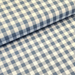Incredibly versatile, our yarn-dyed* 100% cotton gingham fabric is ideal as a dress fabric and eternally popular for school uniforms, tablecloths, bunting, curtains, aprons, cushions, craft projects, Christmas decorations and much, much more. This being the denim colourway. Available to buy at Fabric Focus.