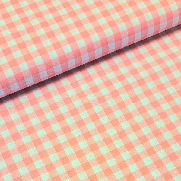 Incredibly versatile, our yarn-dyed* 100% cotton gingham fabric is ideal as a dress fabric and eternally popular for school uniforms, tablecloths, bunting, curtains, aprons, cushions, craft projects, Christmas decorations and much, much more. This being the baby pink colourway. Available to buy at Fabric Focus.