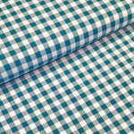 Incredibly versatile, our yarn-dyed* 100% cotton gingham fabric is ideal as a dress fabric and eternally popular for school uniforms, tablecloths, bunting, curtains, aprons, cushions, craft projects, Christmas decorations and much, much more. This being the rich teal colourway. Available to buy at Fabric Focus.