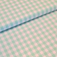 Incredibly versatile, our yarn-dyed* 100% cotton gingham fabric is ideal as a dress fabric and eternally popular for school uniforms, tablecloths, bunting, curtains, aprons, cushions, craft projects, Christmas decorations and much, much more. This being the fresh mint green colourway. Available to buy at Fabric Focus.