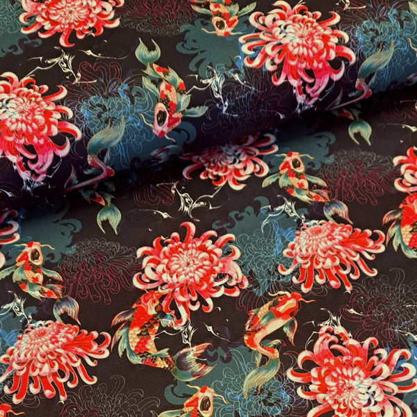  This beautiful stretch cotton fabric is a fantastic to sew with. The the ease of sewing with cotton, but the spandex content means this fabric has a one way stretch.  A striking print of pink and orange koi carp and honeysuckle on a black background. Sold in half metre increments online and in store at Fabric Focus.