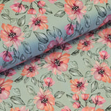  This beautiful stretch cotton fabric is a fantastic to sew with. The the ease of sewing with cotton, but the spandex content means this fabric has a one way stretch.  A striking print of 'zinnias' in pinks and oranges on a light sage background. Sold in half metre increments online and in store at Fabric Focus.