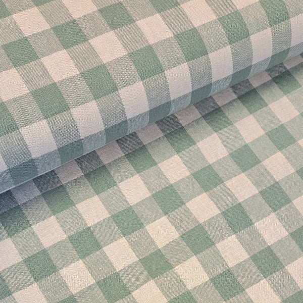 A wonderful medium dressmaking weight linen. Linen mixed with cotton. A gingham check in a soft teal/duckegg and off white.  Available to buy in metre increments from Fabric Focus Edinburgh. 