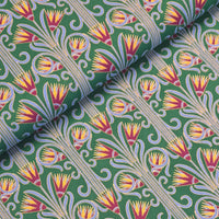 A stunning stylized art deco print in shades of purple, yellow and pale blue, highlighted in metallic gold on a beautiful rich emerald green background. Printed on a beautiful lightweight cotton lawn, perfect for Spring/Summer dresses!  Sold in half metre increments at Fabric Focus.