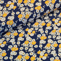 A beautiful print in a Japanese motif style called Ume, yellow and white blossom on a navy background on a soft viscose fabric. Perfect for wrap dresses, wide legged trousers and blouses.
 Sold in half metre increments at Fabric Focus Edinburgh.