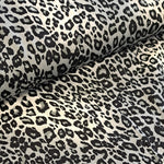 A stunning leopard print of black spots on a silver and white background. Perfect for wrap dresses, wide trousers and blouses Sold in half metre increments.