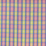 Beautiful cotton polyester mix seersucker in a summer check plaid of pink, lilac and yellow. Available to buy at Fabric Focus Edinburgh.