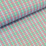 Beautiful cotton polyester mix seersucker in a summer check plaid of pink, green and white. Available to buy at Fabric Focus Edinburgh.