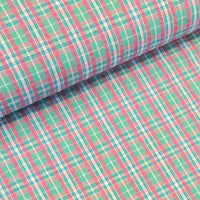 Beautiful cotton polyester mix seersucker in a summer check plaid of pink, green and white. Available to buy at Fabric Focus Edinburgh.