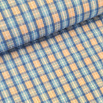 Beautiful cotton polyester mix seersucker in a summer check plaid of blue, beige and white. Available to buy at Fabric Focus Edinburgh.