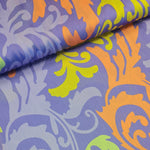 Polyester with lilac background and gold and orange oversized 'plumes'. Available to buy in half metre increments at Fabric Focus.