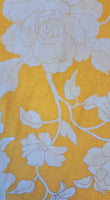 Modern with a vintage feel cotton lawn print with ivory flowers outlined in metallic gold on a sunshine yellow background! Sold at Fabric Focus.