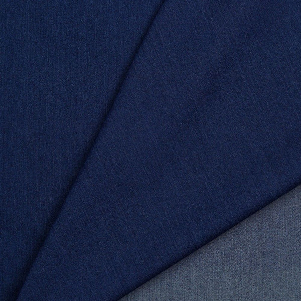 Mid-weight polyester and recycled cotton mix denim with a hint of stretch. Available in 3 indigo shades, this being the darkest of the three and ideal for clothing, bag making and lighter furnishing applications. Available to buy in half metre increments.