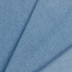 Mid-weight polyester and recycled cotton mix denim with a hint of stretch. Available in 3 indigo shades, this being the lightest of the three and ideal for clothing, bag making and lighter furnishing applications. Available to buy in half metre increments.