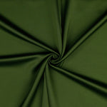 A beautiful soft polyester satin that has a subtle sateen sheen rather than a high gloss finish usually associated with satins. Because of this it has a high-end expensive look. Perfect for evening wear and day wear alike! This being the gorgeous Hunter green colourway.  Sold in half meter lengths at Fabric Focus.