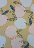 A stunning print of white and peach coloured apples with black/green leaves on a sand ochre background. Perfect for wrap dresses, wide legged trousers and blouses. Great for all summer designs including trousers and dresses. Sold in half metre increments.