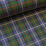 Polyester Viscose tartan in Macleod clan, dark navy and dark green with red and yellow over square plaid. Sold in half metre increments at Fabric Focus.
