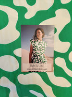 viscose twill with cream shapes on emerald background