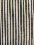 Textured fabric with black and white horizontal stripes