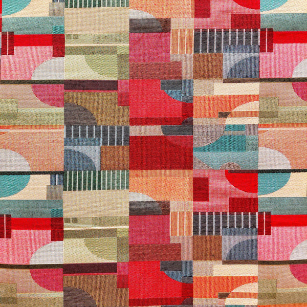 Colorful geometric patterned fabric with a mix of red, blue, green, and brown colors.