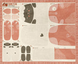 Patterned paper with farm animal illustrations and text on a beige background
