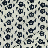 A wonderful medium dressmaking weight linen. Linen mixed with natural viscose in an ecru shade with an all over navy blue floral embroidery. Perfect for dresses and jackets. This being the classic natural oatmeal colourway.  Available to buy in metre increments from Fabric Focus Edinburgh.